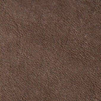 Brown leather texture with a granular matte finish, displaying tonal variations and a dense, consistent surface lacking visible seams.