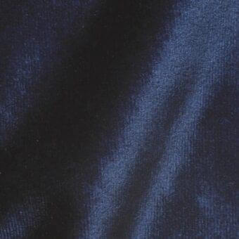 Blue velour fabric sample VE14 with a dense pile, exhibiting a subtle striped pattern and vertical folds in the textured surface.