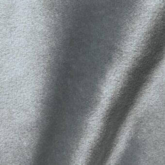 Brilliant Velour VE12 fabric sample, cool gray, dense short pile with matte finish and subtle directional texture.