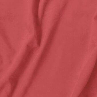 Vismara Eco Nabuk fabric swatch in muted red, draped to show texture and sheen, with a consistent color and smooth woven construction.