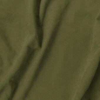 Olive green textile swatch with matte finish, folded to display uniform weave and texture; label reads "vismara > eco nabuk (a) > 35 en49".