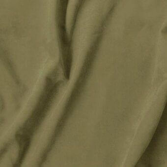 Olive-green fabric swatch displays a matte sheen, tight weave, and soft folds; label reads "vismara > eco nabuk (a) > 36 en17".
