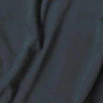 Charcoal gray fabric drape with matte finish, exhibiting soft folds and subtle tonal variations, textured and lightweight appearance.