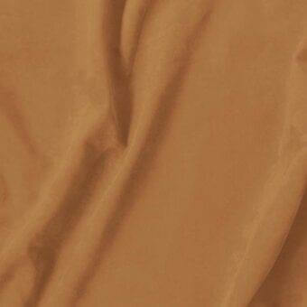 Brown fabric drape with soft sheen, exhibiting tonal variations and flowing curves, smooth texture, diffused lighting.