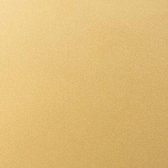 Metallic gold textured surface with granular, matte finish and even lighting, resembling lacquered metal coating.