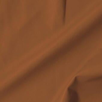 Vismara leather swatch, soft brown, diagonally draped; matte finish, dense weave, subtle tonal variations in texture.