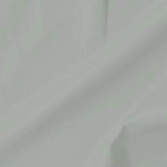 Light grey fabric texture with draped folds and a matte finish, presented on a neutral background with soft, diffused lighting.