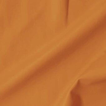 Leather swatch, warm orange, smooth texture; folded material labeled “vismara soft extra 38 ga14 cat.soft” displays subtle sheen and matte finish.