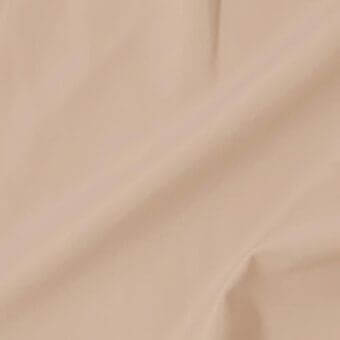 Vismara leather swatch, soft extra, in muted beige with matte finish and diagonal folds displaying texture and drape.