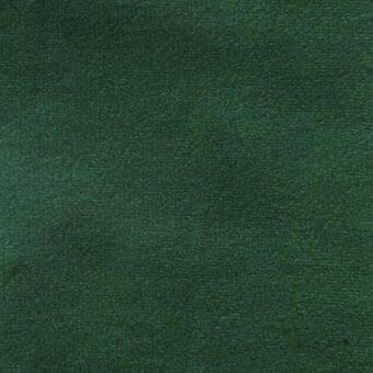 Forest green matt velour fabric texture with short, dense pile and uniform nap, displaying a consistent matte finish and subtle surface blur.