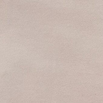Matte velour fabric sample, warm beige, dense plush texture with subtle nap; vismara 21.ve.me27 upholstery material.