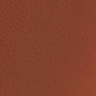 Reddish-brown leather texture with irregular grain, matte finish, and subtle nubuck-like quality; sample labeled “vismara > nabuk (extra) > na19”.