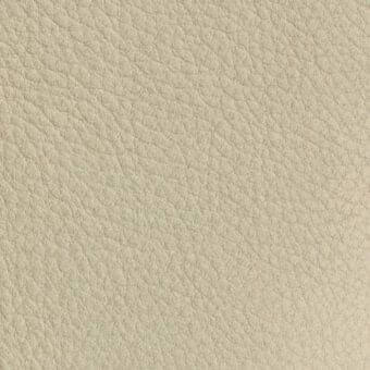 Beige nubuck leather texture with a dense grain, matte finish, and subtle wrinkles displaying a warm, neutral tone and pliable quality.