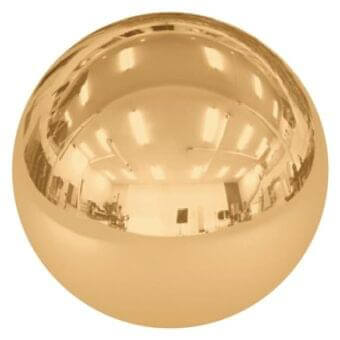 Polished gold steel sphere reflecting a studio interior with white ceiling, recessed lights, camera, monitor, and dark panel.